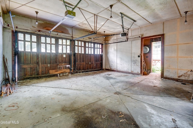 61 Mohawk St, Fort Plain, NY 13339 - garage featuring a garage door opener