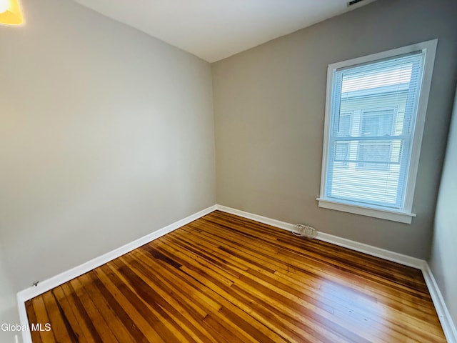 471-473 Harrison Ave, Schenectady, NY 12306 - empty room with baseboards and dark wood-type flooring