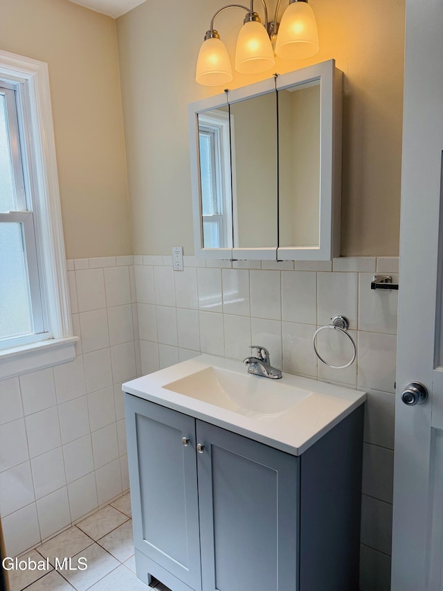 471-473 Harrison Ave, Schenectady, NY 12306 - bathroom featuring vanity, tile walls, plenty of natural light, and tile patterned flooring