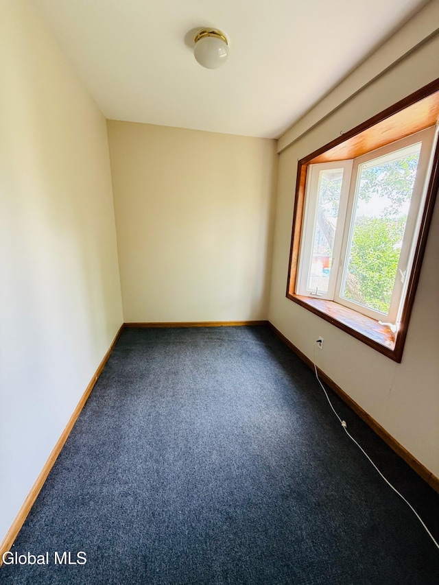 471-473 Harrison Ave, Schenectady, NY 12306 - unfurnished room with dark colored carpet and baseboards