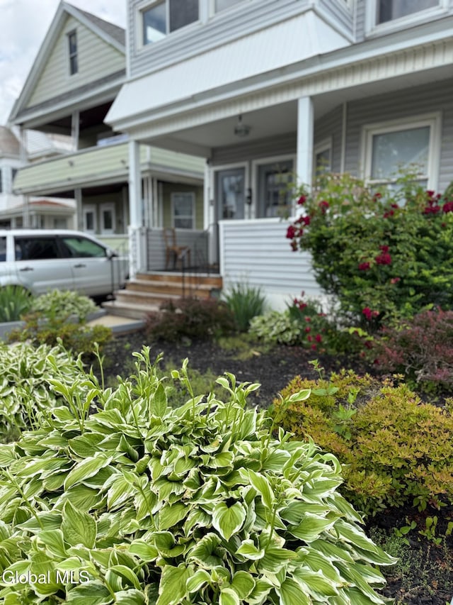 471-473 Harrison Ave, Schenectady, NY 12306 - view of front of home featuring a porch