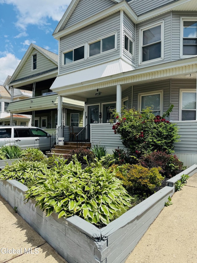 471-473 Harrison Ave, Schenectady, NY 12306 - view of front facade with a porch