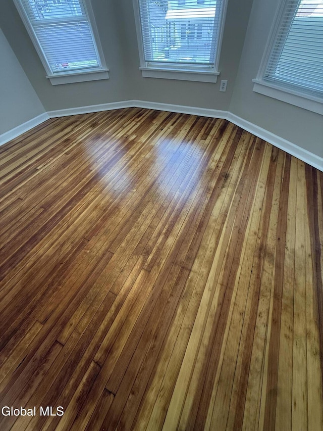 471-473 Harrison Ave, Schenectady, NY 12306 - spare room with dark wood finished floors and baseboards