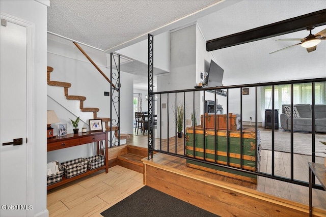 10 Heather Ln, Johnstown, NY 12078 - hall with a textured ceiling, stairs, and beam ceiling