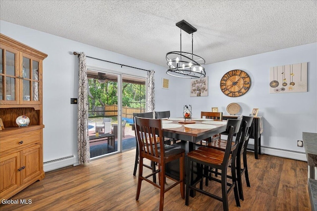10 Heather Ln, Johnstown, NY 12078 - dining room with a baseboard radiator, dark wood-style floors, a textured ceiling, and a chandelier