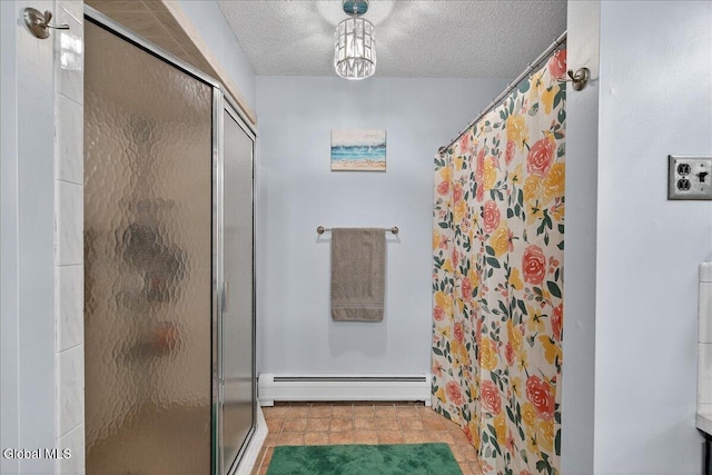 10 Heather Ln, Johnstown, NY 12078 - bathroom featuring a baseboard heating unit, a shower stall, tile patterned flooring, and a textured ceiling