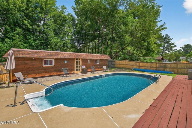 10 Heather Ln, Johnstown, NY 12078 - view of pool featuring a patio area and a fenced backyard