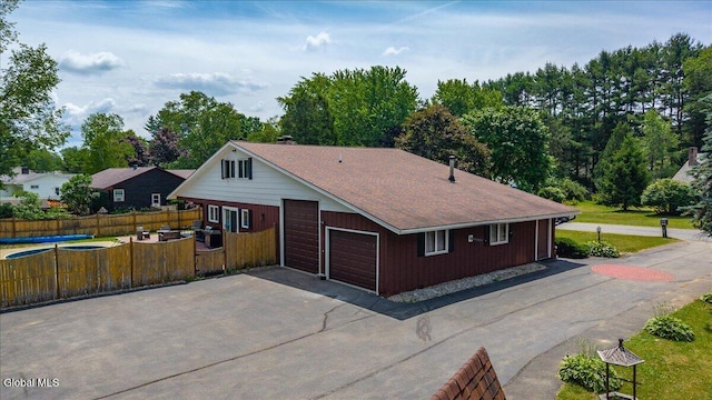 10 Heather Ln, Johnstown, NY 12078 - view of front of property with a garage and driveway