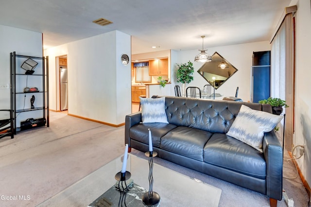 5 Wendfair Ter, Colonie, NY 12205 - living area featuring light colored carpet and baseboards