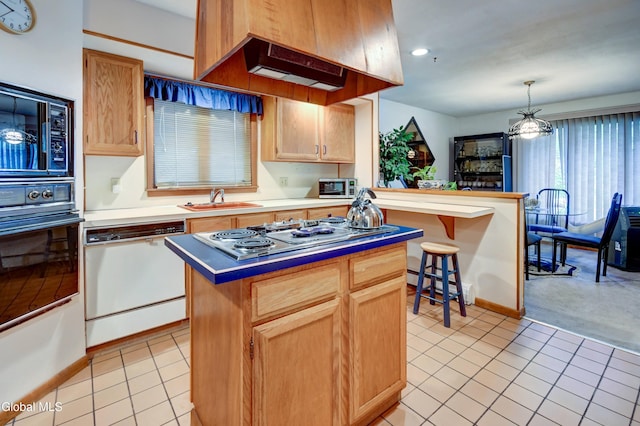 5 Wendfair Ter, Colonie, NY 12205 - kitchen featuring black appliances, light tile patterned flooring, a kitchen island, extractor fan, and recessed lighting