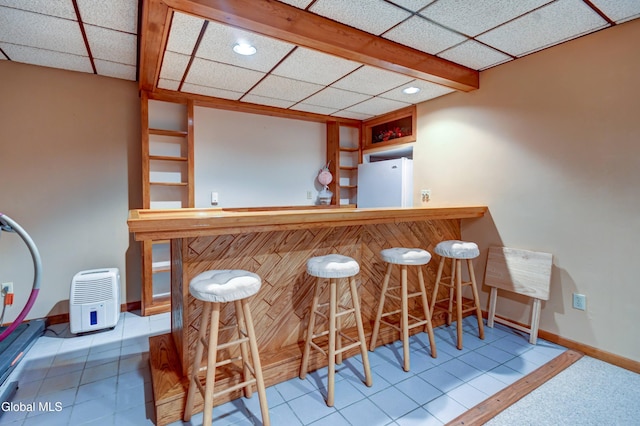 5 Wendfair Ter, Colonie, NY 12205 - indoor dry bar featuring freestanding refrigerator, recessed lighting, tile patterned floors, and a drop ceiling