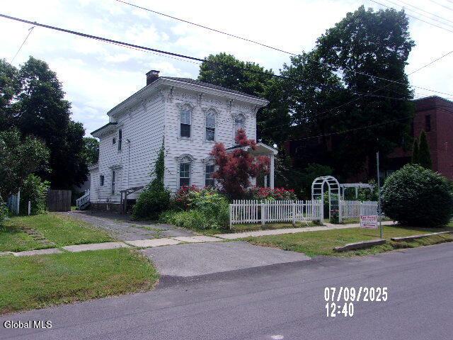 20 N 4th Ave, Ilion, NY 13357 - view of front facade featuring a chimney
