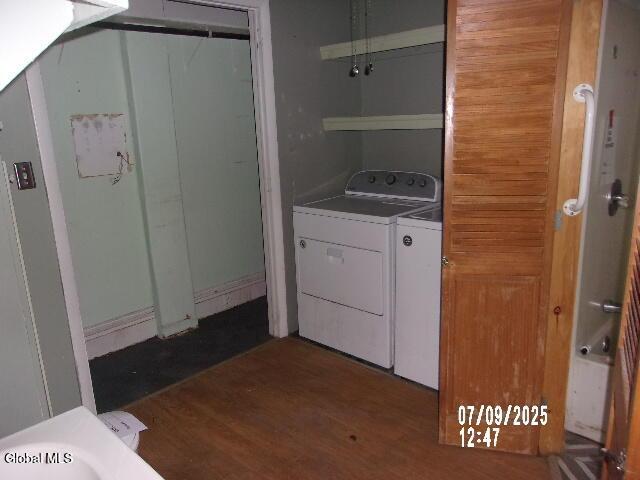 20 N 4th Ave, Ilion, NY 13357 - laundry room featuring washer and dryer and wood finished floors