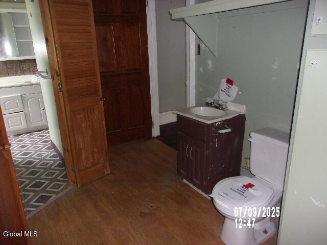 20 N 4th Ave, Ilion, NY 13357 - bathroom with wood finished floors and vanity