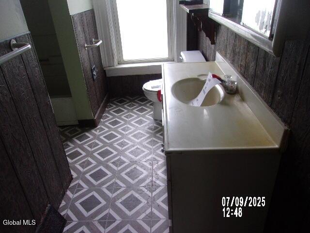 20 N 4th Ave, Ilion, NY 13357 - bathroom with tile patterned floors and vanity