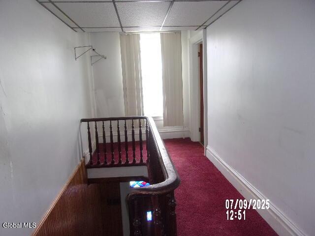 20 N 4th Ave, Ilion, NY 13357 - bedroom featuring carpet floors and a paneled ceiling