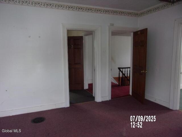 20 N 4th Ave, Ilion, NY 13357 - empty room featuring carpet floors and baseboards