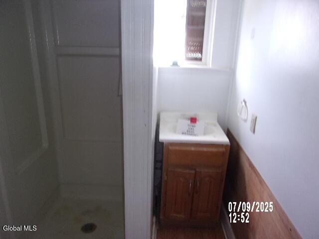 20 N 4th Ave, Ilion, NY 13357 - bathroom with a shower stall and vanity