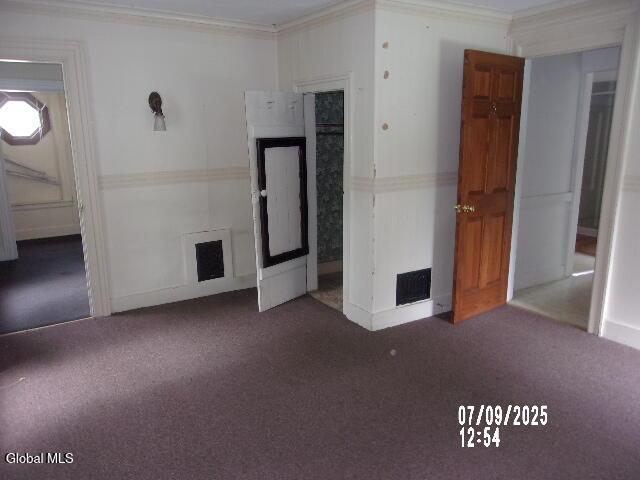 20 N 4th Ave, Ilion, NY 13357 - empty room featuring ornamental molding and carpet