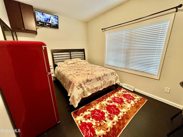 101 Prospect St, Schenectady, NY 12308 - bedroom with baseboards and freestanding refrigerator