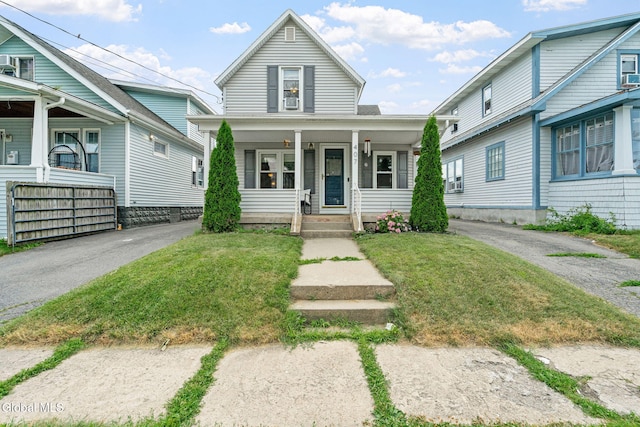 407 Huston St, Scotia, NY 12302 - view of front of property featuring covered porch and a front lawn