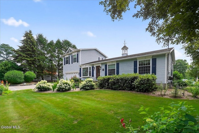 7 Marquette Ave, Colonie, NY 12110 - view of front facade featuring a front yard and a garage
