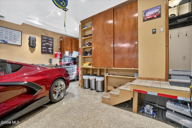 7 Marquette Ave, Colonie, NY 12110 - garage featuring baseboard heating
