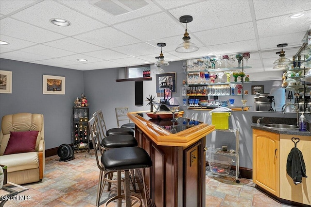 7 Marquette Ave, Colonie, NY 12110 - indoor wet bar with a drop ceiling, light stone finish floors, recessed lighting, and decorative light fixtures