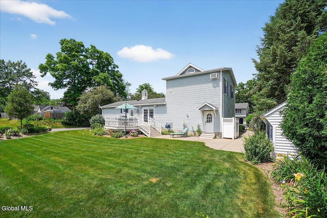 7 Marquette Ave, Colonie, NY 12110 - back of house with a deck, a yard, a patio area, and entry steps