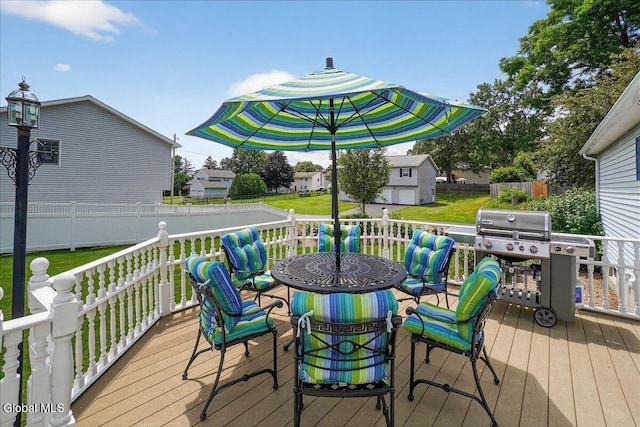 7 Marquette Ave, Colonie, NY 12110 - deck with area for grilling, a fenced backyard, and outdoor dining area