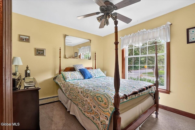 7 Marquette Ave, Colonie, NY 12110 - bedroom featuring a baseboard heating unit, multiple windows, and ceiling fan