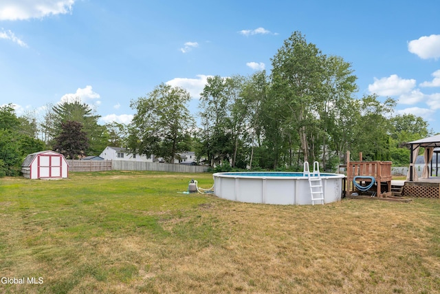 3002 Morgan Ct, Schenectady, NY 12306 - view of yard featuring a storage shed, an outdoor pool, and view of wooded area