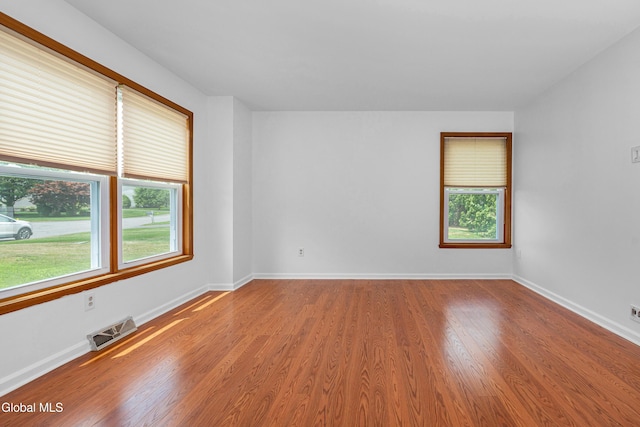 3002 Morgan Ct, Schenectady, NY 12306 - empty room featuring healthy amount of natural light and light wood finished floors