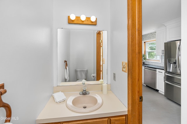 3002 Morgan Ct, Schenectady, NY 12306 - bathroom featuring vanity and tile patterned flooring