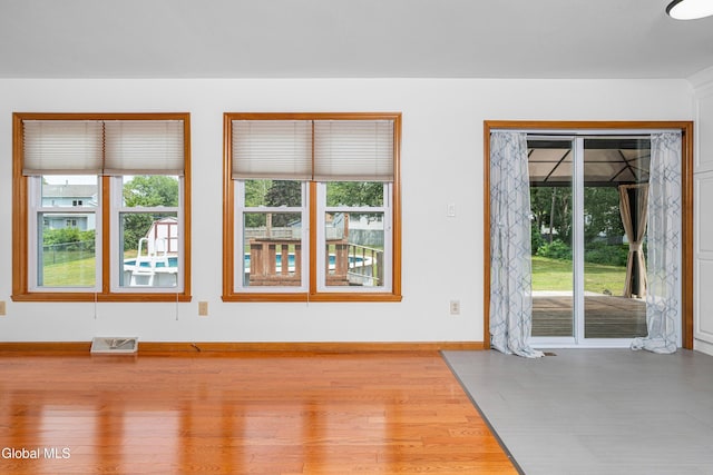 3002 Morgan Ct, Schenectady, NY 12306 - spare room with healthy amount of natural light and wood finished floors