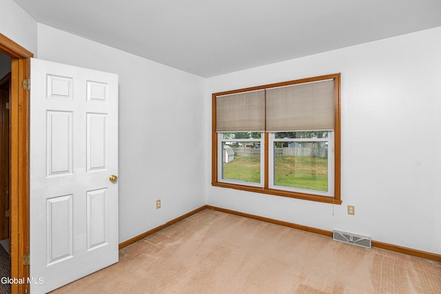 3002 Morgan Ct, Schenectady, NY 12306 - unfurnished room with light colored carpet and baseboards