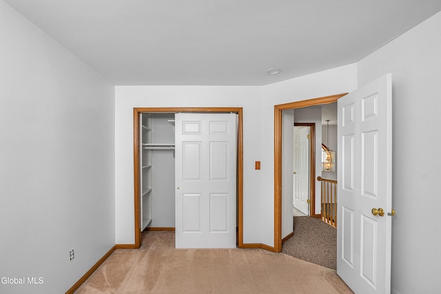 3002 Morgan Ct, Schenectady, NY 12306 - unfurnished bedroom featuring light colored carpet and a closet