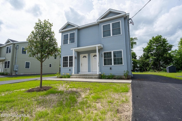 420 Summit Ave, Schenectady, NY 12307 - view of property featuring a front lawn and a storage shed