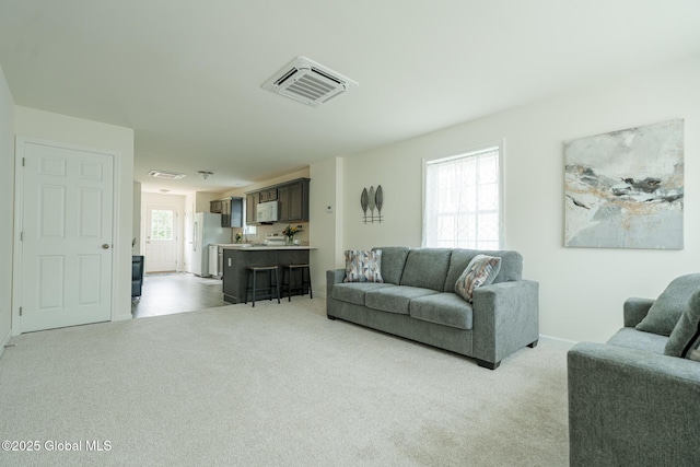 420 Summit Ave, Schenectady, NY 12307 - living area featuring light carpet and baseboards