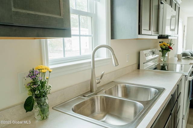 420 Summit Ave, Schenectady, NY 12307 - kitchen with white appliances and light countertops