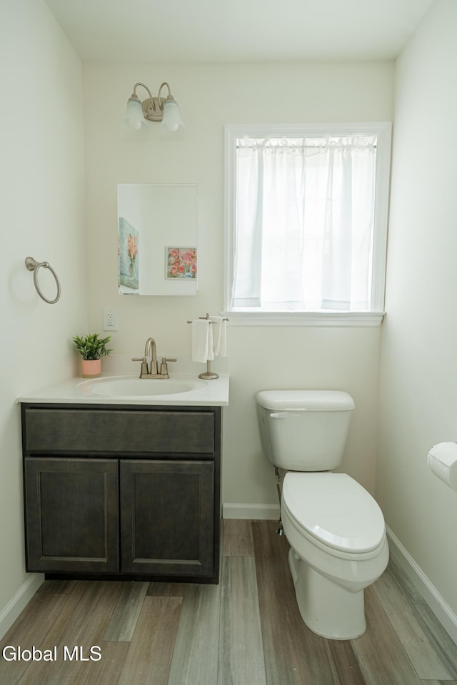 424 Summit Ave, Schenectady, NY 12307 - bathroom with wood finished floors and vanity