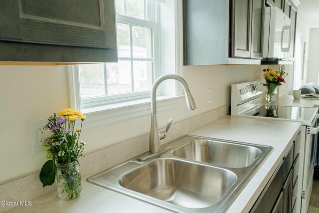424 Summit Ave, Schenectady, NY 12307 - kitchen with white appliances and light countertops
