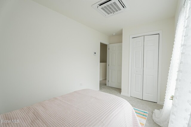 424 Summit Ave, Schenectady, NY 12307 - bedroom featuring a closet and light colored carpet