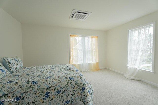 424 Summit Ave, Schenectady, NY 12307 - carpeted bedroom featuring multiple windows