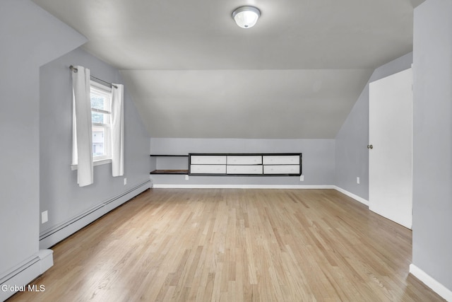 6 Briarwood Rd, Colonie, NY 12211 - bonus room featuring baseboard heating, lofted ceiling, and wood finished floors
