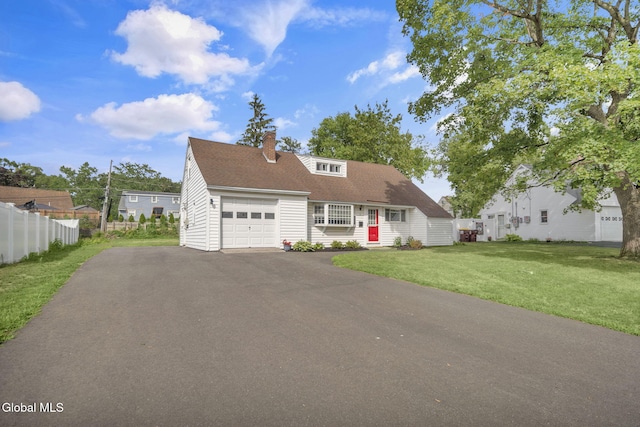 6 Briarwood Rd, Colonie, NY 12211 - cape cod-style house with asphalt driveway, a garage, and a chimney