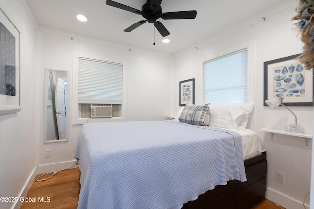83 Pilot Knob Rd, Queensbury, NY 12804 - bedroom with wood finished floors, cooling unit, recessed lighting, and ceiling fan
