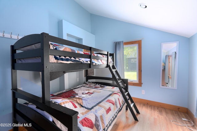 83 Pilot Knob Rd, Queensbury, NY 12804 - bedroom with lofted ceiling and wood finished floors