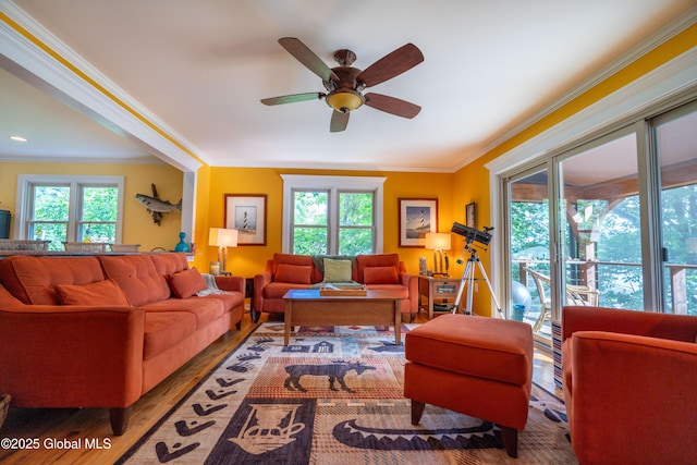 83 Pilot Knob Rd, Queensbury, NY 12804 - living area with plenty of natural light, ornamental molding, wood finished floors, and ceiling fan