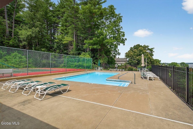 3 Pine Ridge Rd, Saratoga Springs, NY 12866 - community pool featuring a tennis court and a patio area